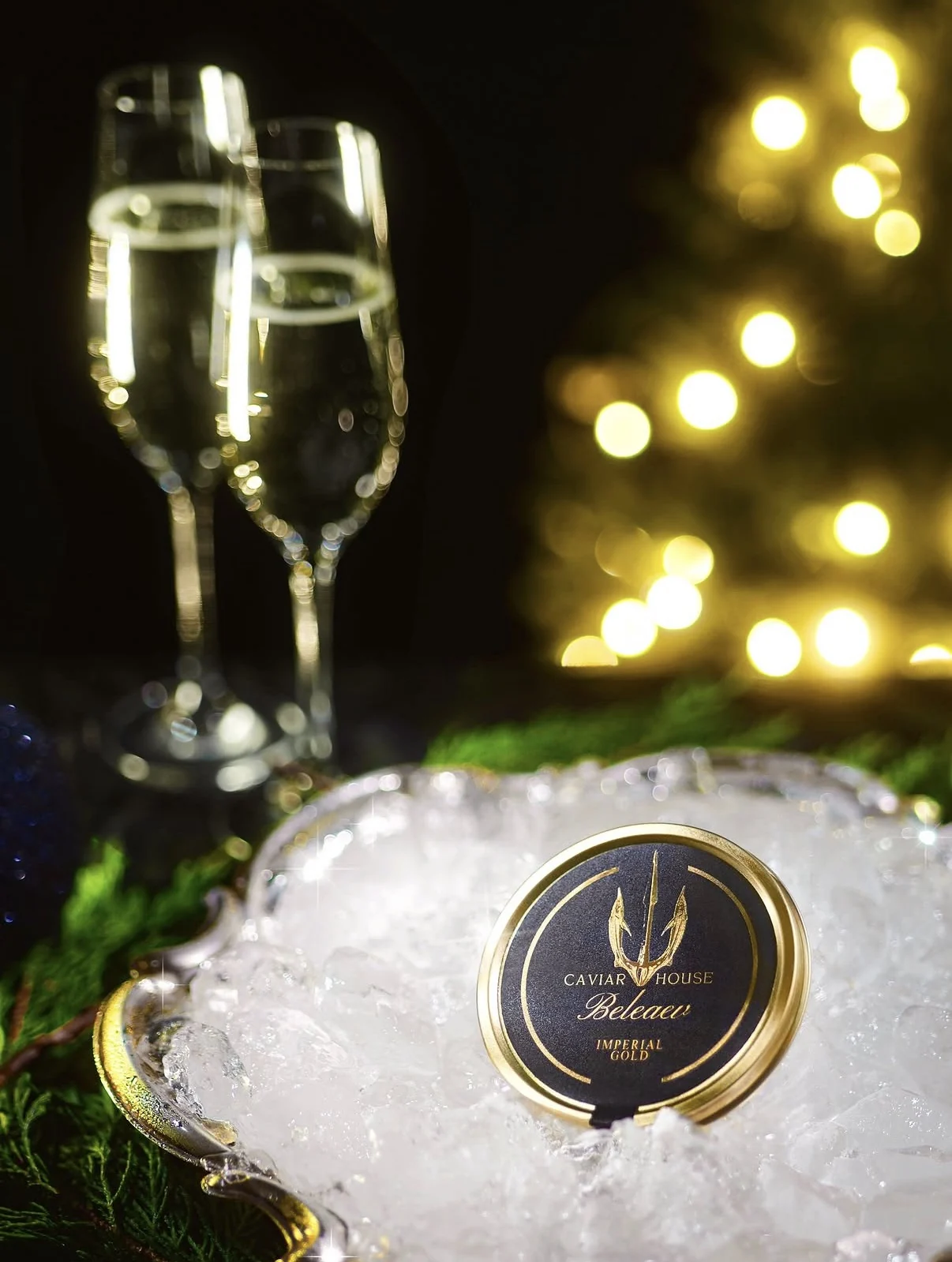 Caviar and champagne photographed on a festive table